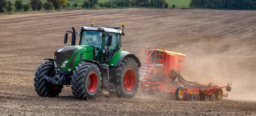 Tractors working a field